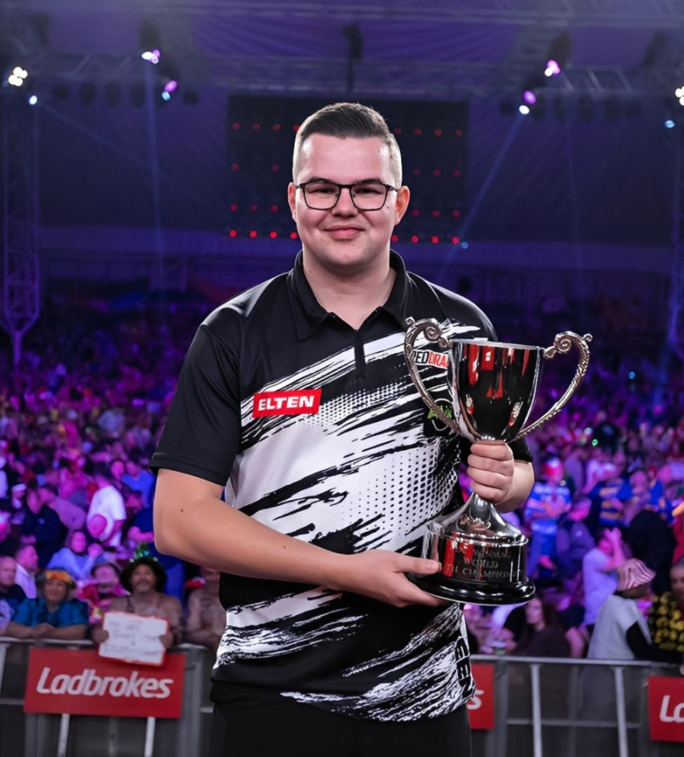 Gian van Veen holding the World Youth Championship trophy